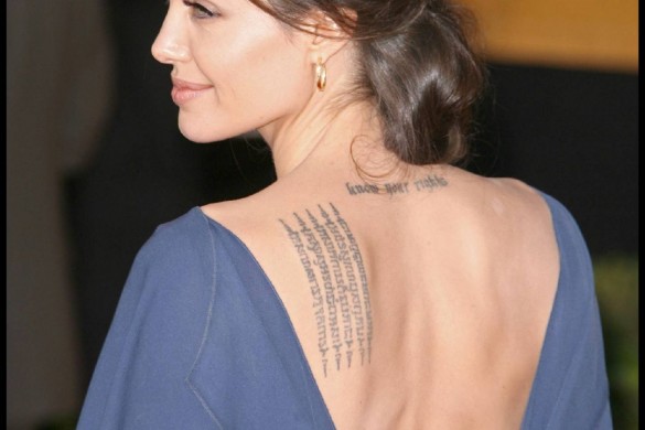 Angelina Jolie efface ses tatouages en référence à Brad Pitt